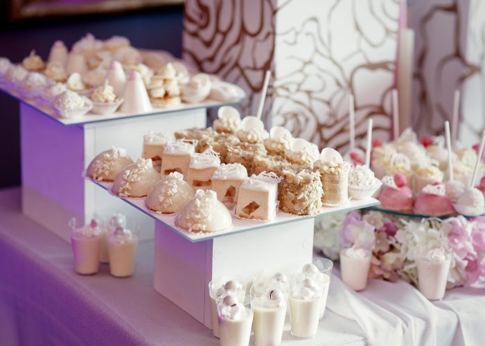 White boxes with plates for white sweets